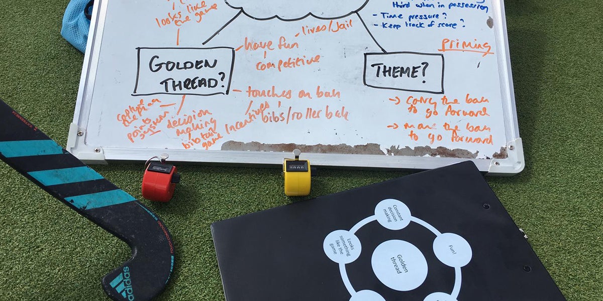 Coach, golden thread and hockey coaching materials