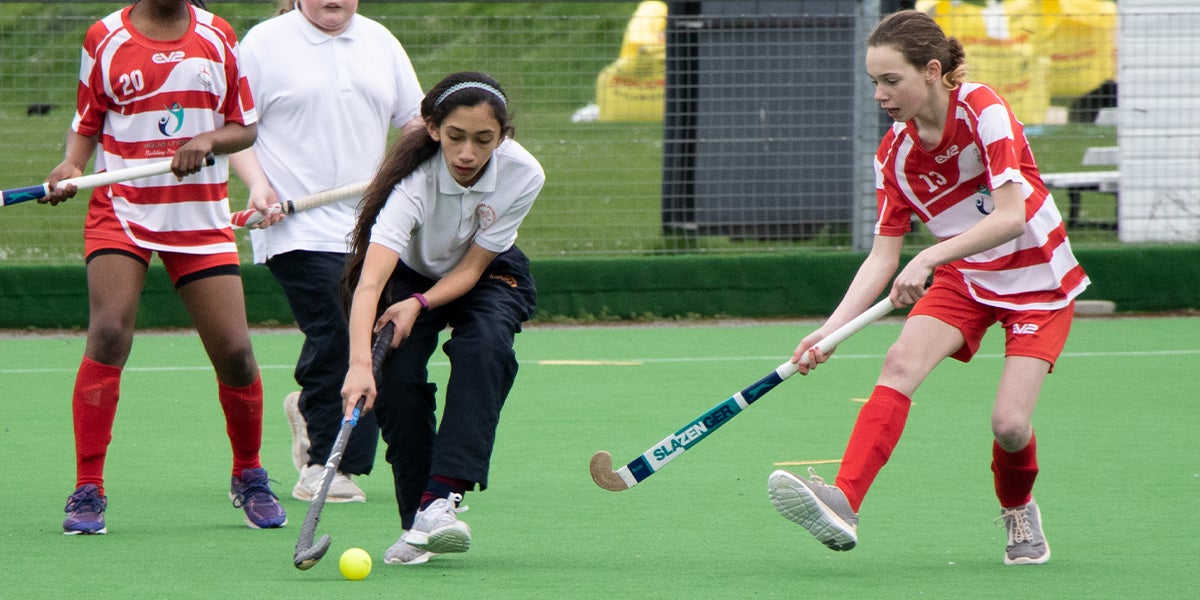 Slough Go Girls Tournament. Girls from Schools playing Hockey