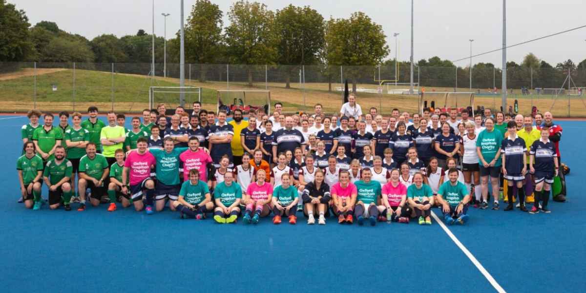 Big group of hockey players on an astroturf